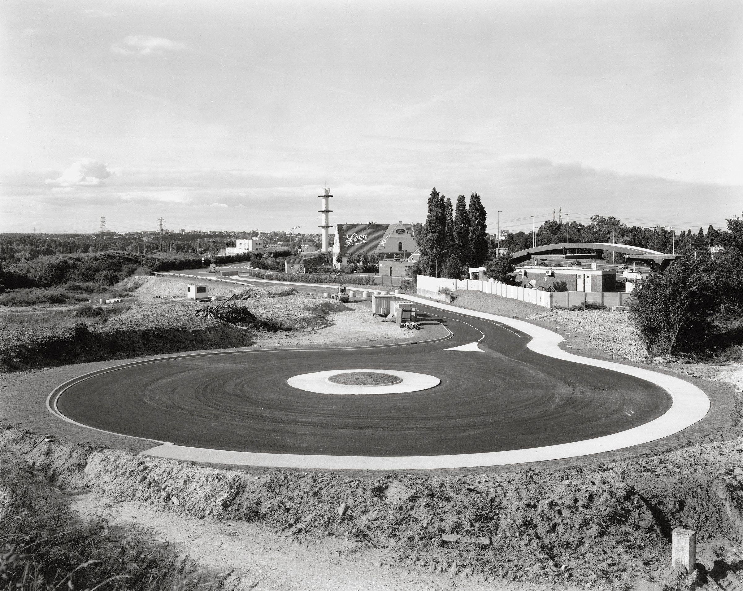 Hexagone 1 — The Manufactured Landscape — Roundabout behind a shopping centre, Val-d'Oise, 2000