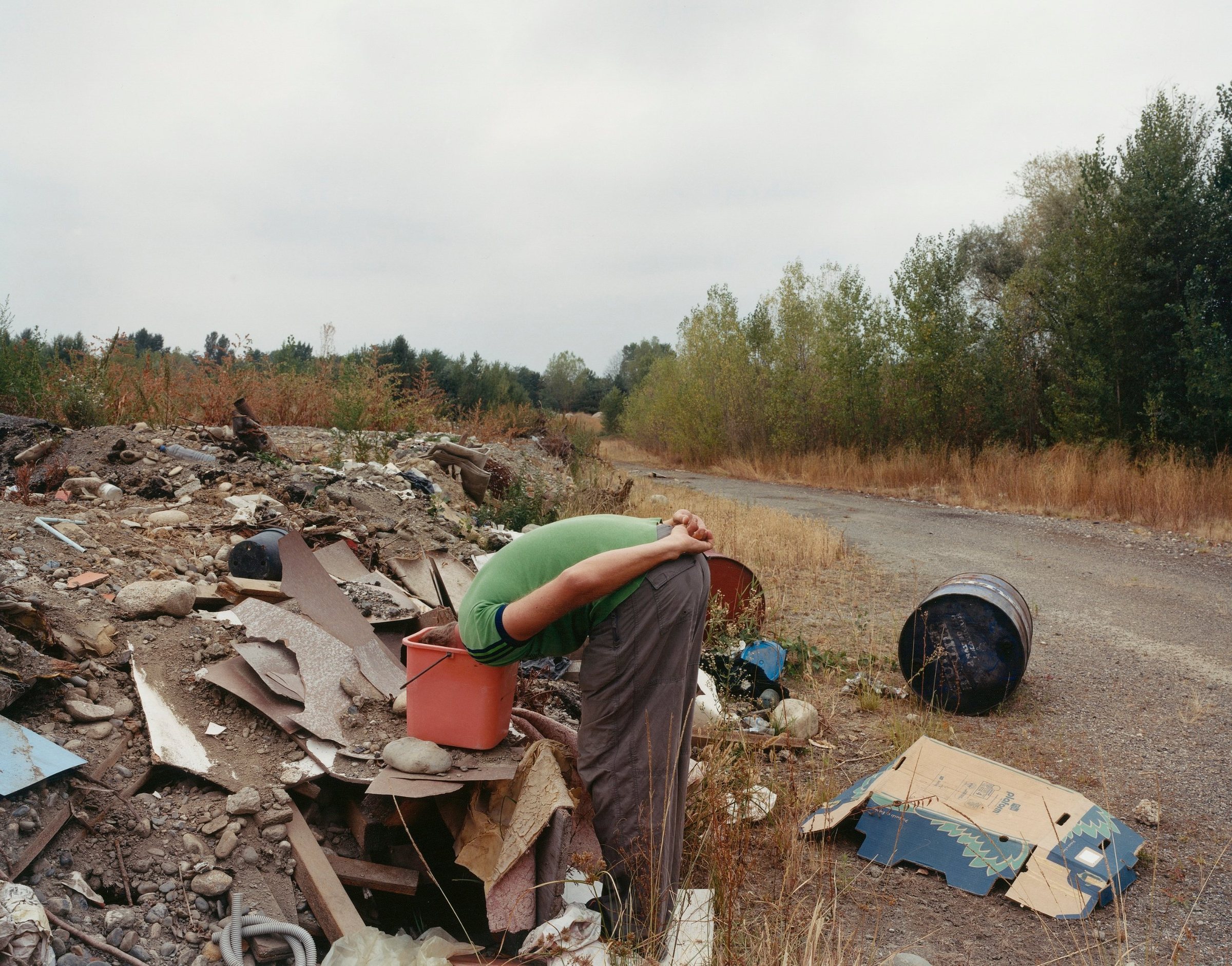 Hexagone 2 — The Landscape Consumed — Self-portrait, illegal dump near Tarbes, 2003